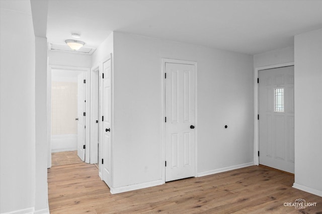 hallway featuring light hardwood / wood-style flooring