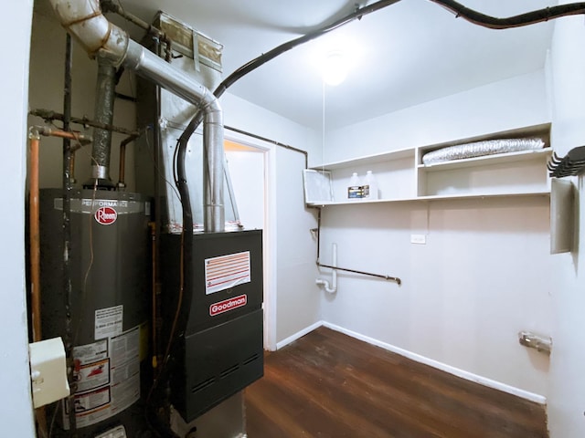 utility room featuring gas water heater