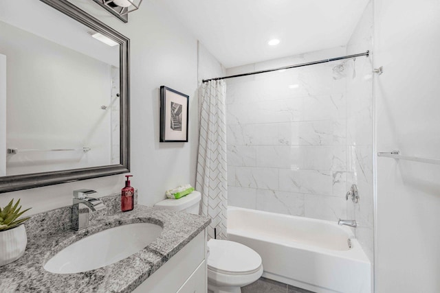 full bathroom with vanity, toilet, and shower / tub combo