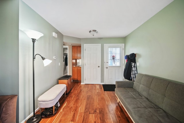 foyer with light hardwood / wood-style floors