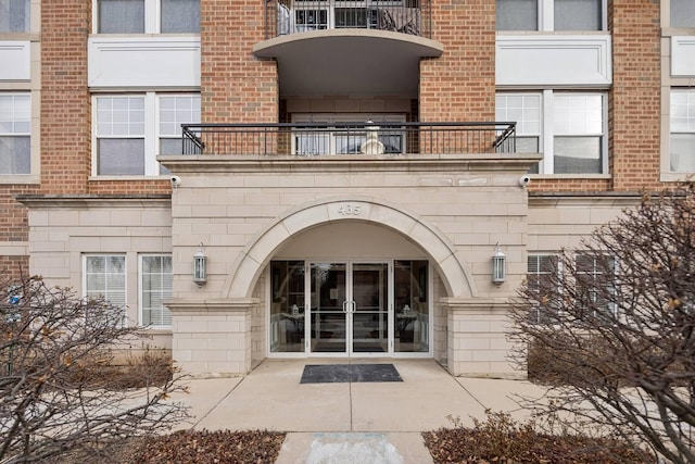 doorway to property with a balcony