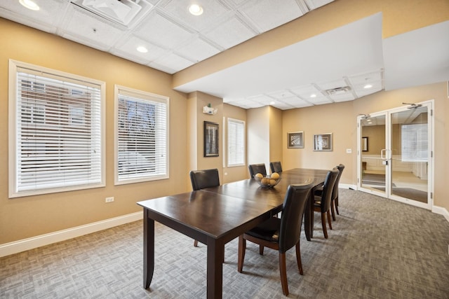 dining area featuring carpet floors