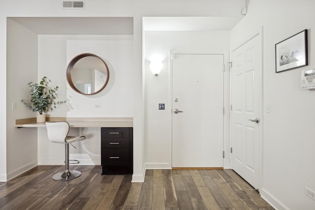 bathroom with hardwood / wood-style floors