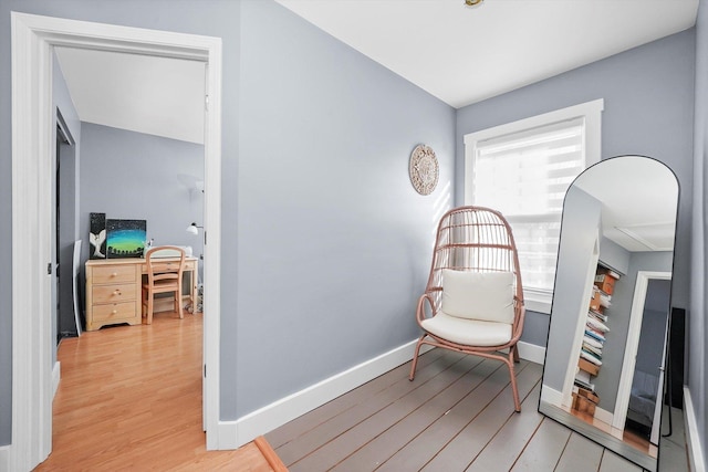 living area with light hardwood / wood-style floors