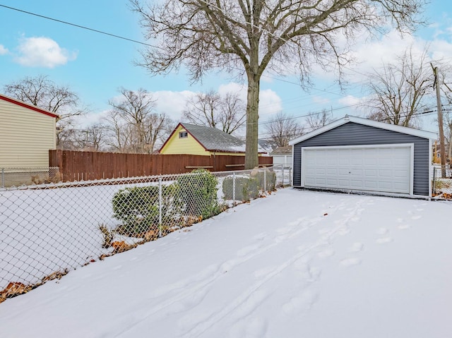 exterior space featuring an outbuilding and a garage