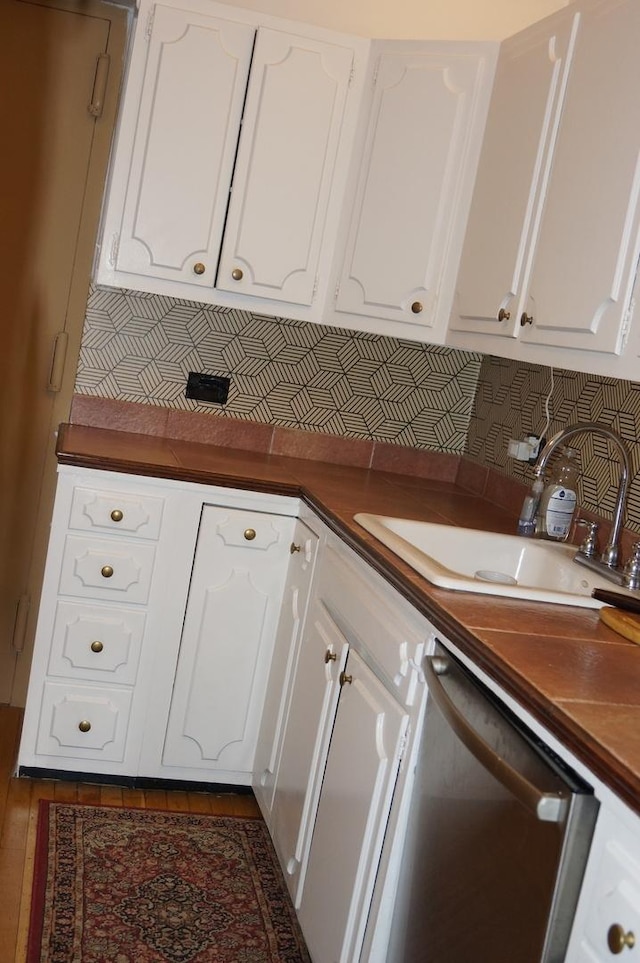 kitchen with sink and white cabinets