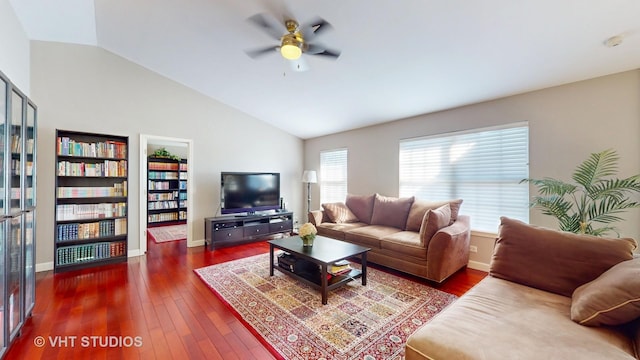 living room featuring lofted ceiling, ceiling fan, and dark hardwood / wood-style floors