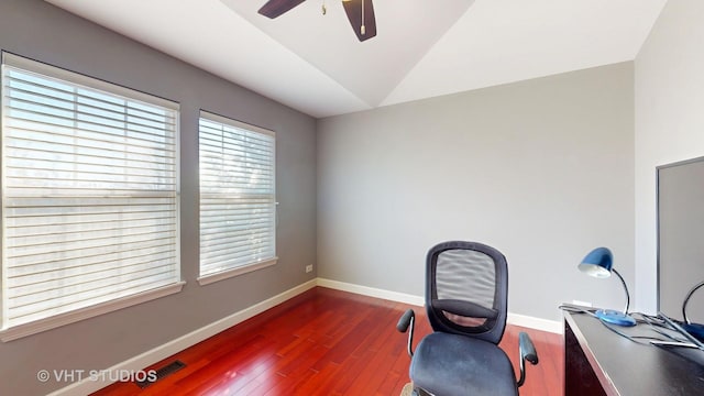 office area featuring vaulted ceiling, ceiling fan, and dark hardwood / wood-style flooring