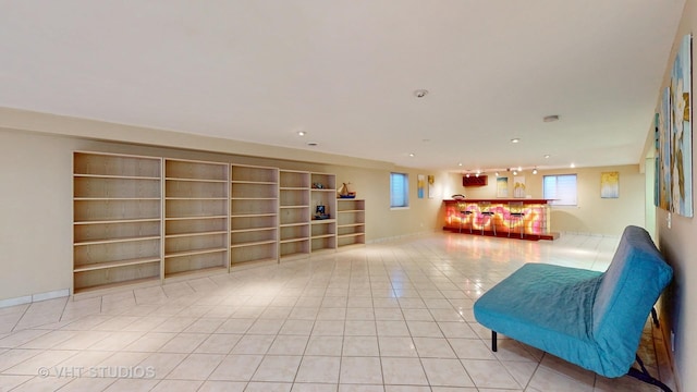 unfurnished room with light tile patterned floors