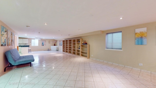 sitting room featuring light tile patterned floors