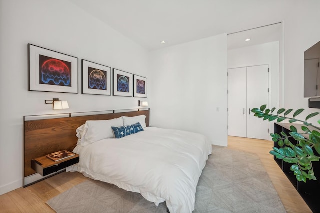 bedroom with light hardwood / wood-style floors