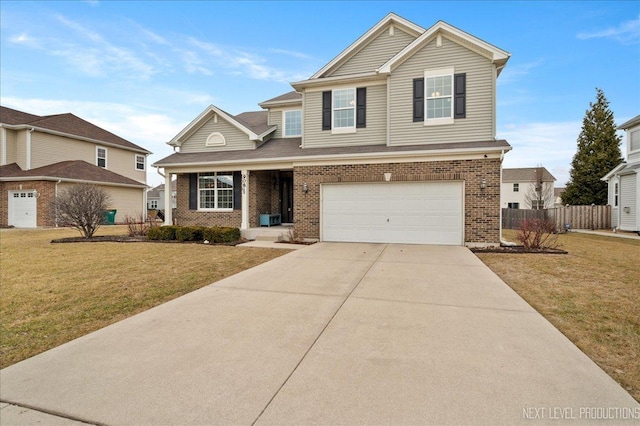 view of front facade with a garage and a front lawn