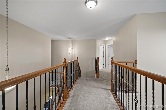 hallway featuring carpet