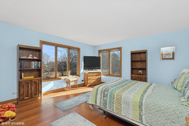 bedroom featuring hardwood / wood-style floors