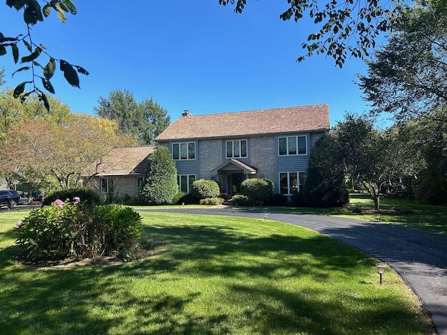 view of front of house with a front lawn