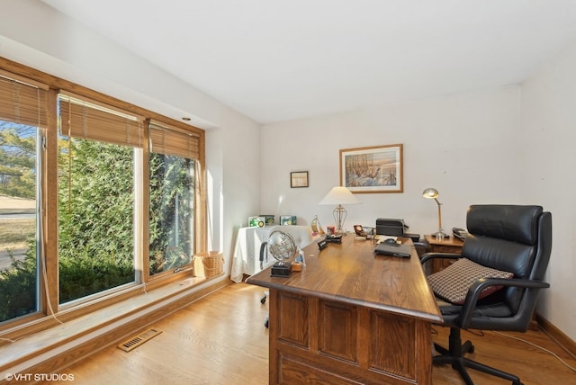 office space featuring light wood-type flooring