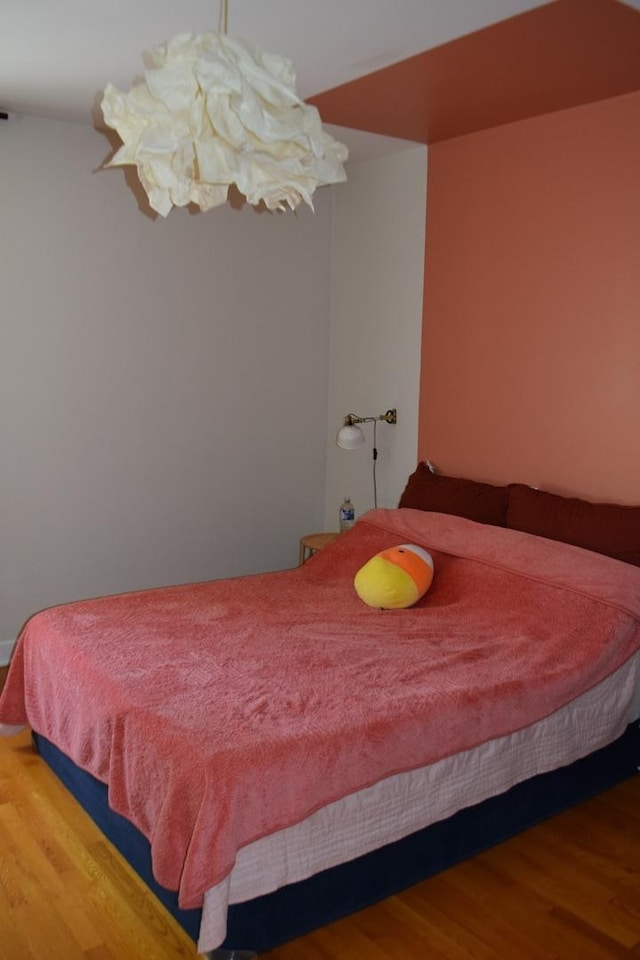 bedroom featuring hardwood / wood-style floors