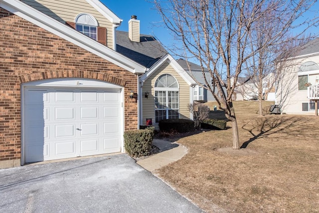 view of home's exterior featuring a garage