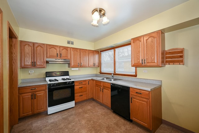 kitchen featuring dishwasher, sink, and gas range