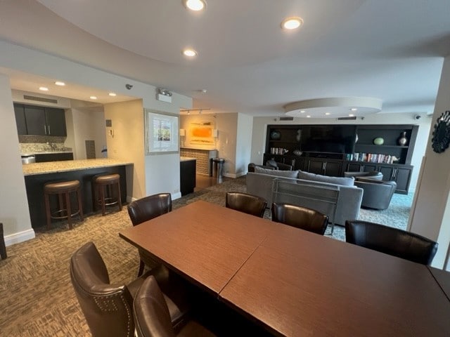 view of carpeted dining area