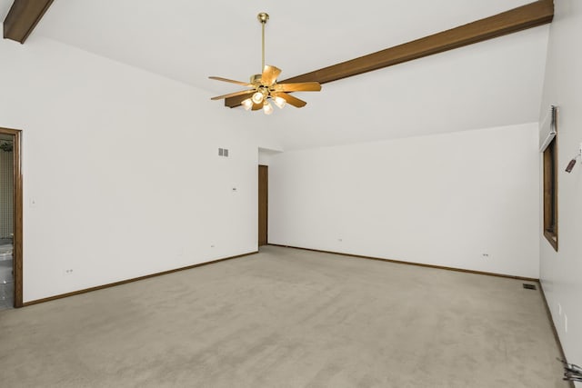 unfurnished living room with ceiling fan, vaulted ceiling with beams, and light colored carpet