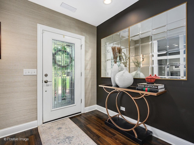 foyer with dark hardwood / wood-style floors