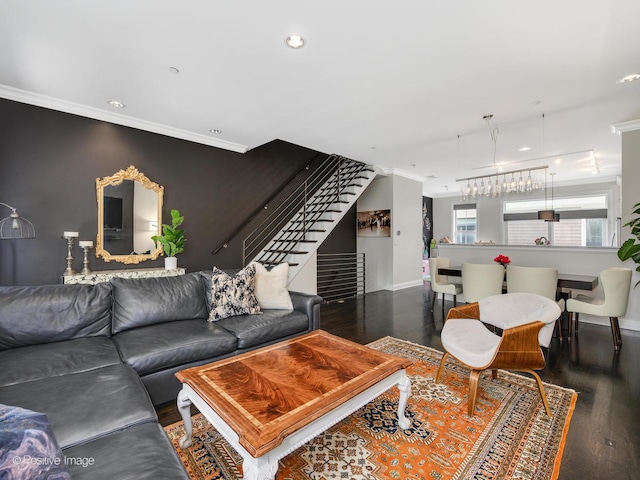 living room featuring crown molding and dark hardwood / wood-style floors