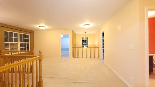 hallway featuring carpet floors