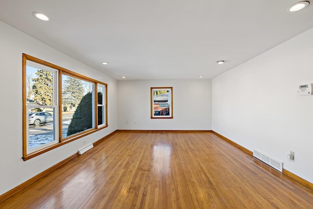 empty room featuring light hardwood / wood-style flooring