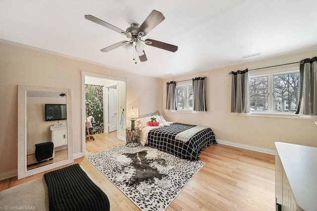 bedroom featuring ceiling fan and light wood-type flooring