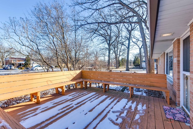 view of snow covered deck