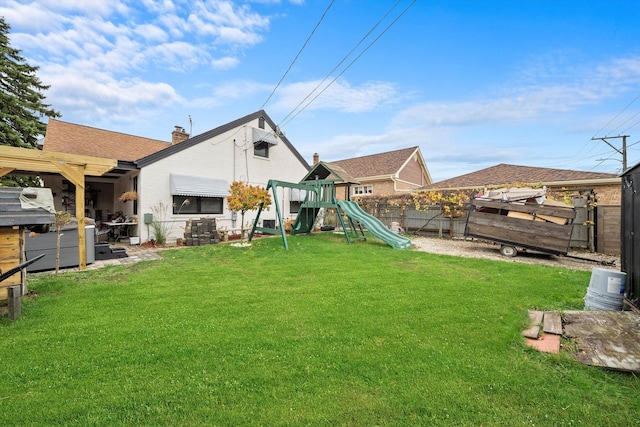 view of yard featuring a playground