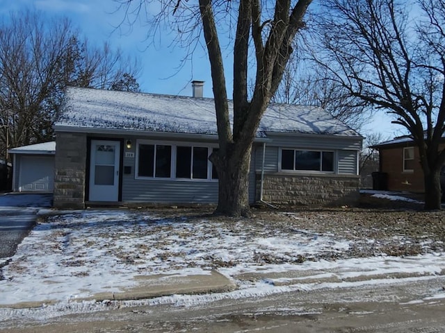 view of front of property featuring a garage