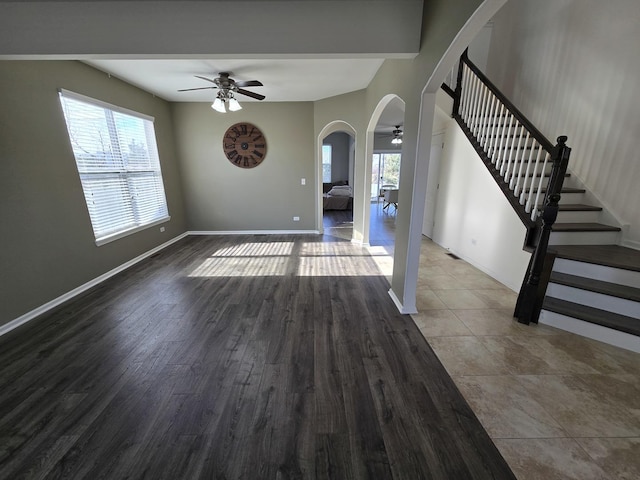 interior space featuring ceiling fan and hardwood / wood-style flooring