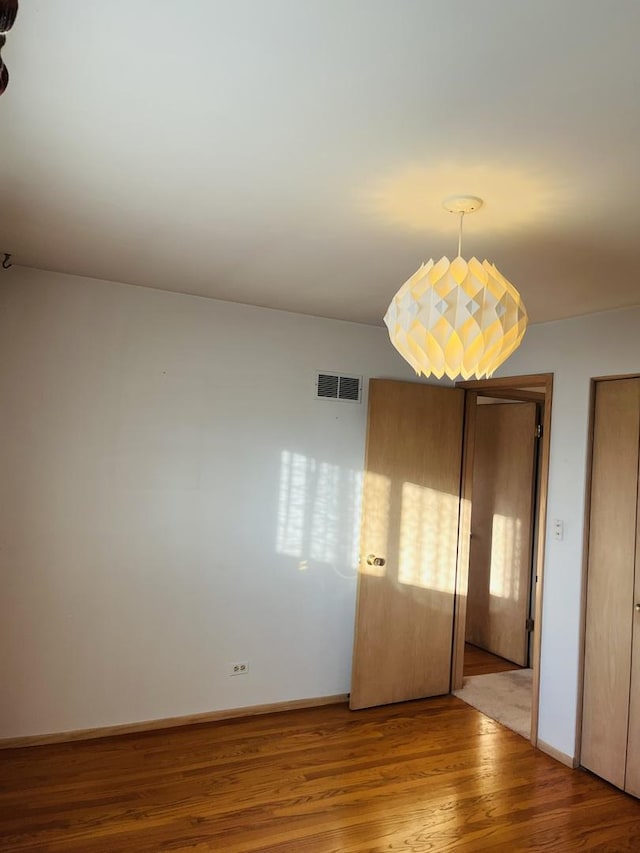 unfurnished bedroom featuring light hardwood / wood-style flooring