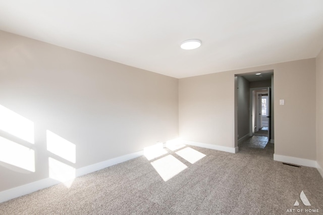 view of carpeted spare room