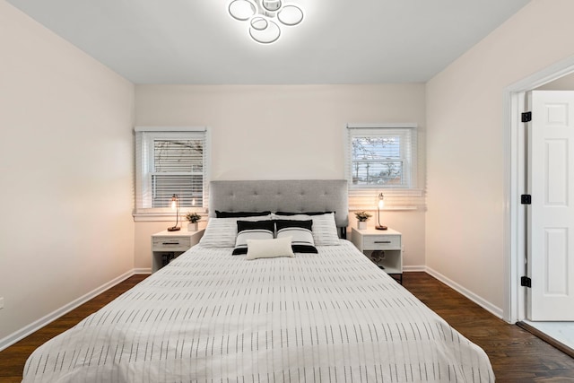 bedroom featuring dark hardwood / wood-style flooring