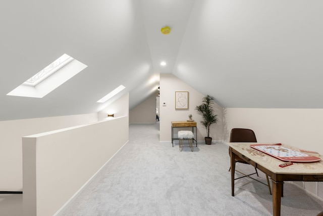 carpeted office with vaulted ceiling