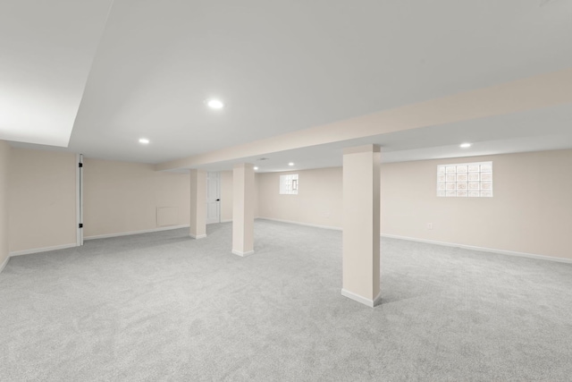 basement with light colored carpet