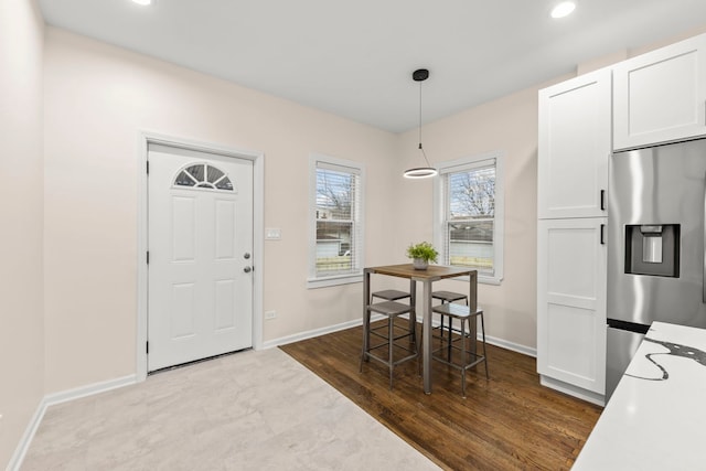 dining space featuring light hardwood / wood-style flooring