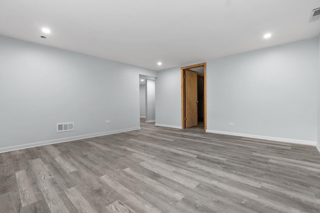 unfurnished room with light hardwood / wood-style flooring