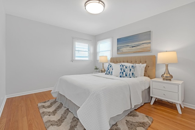 bedroom with light hardwood / wood-style floors