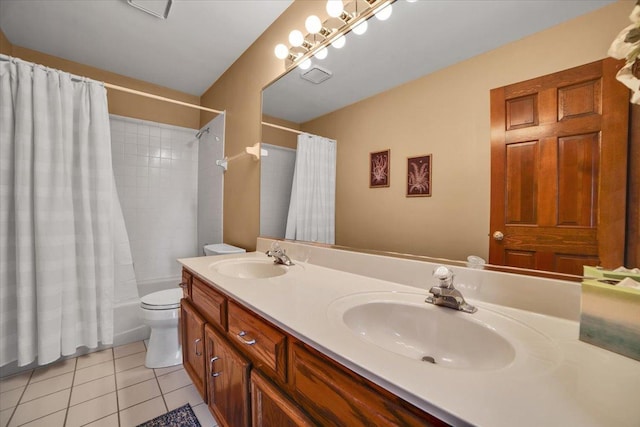 full bathroom featuring toilet, vanity, tile patterned floors, and shower / bathtub combination with curtain