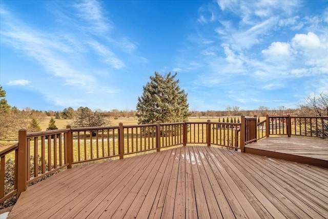 wooden terrace with a rural view