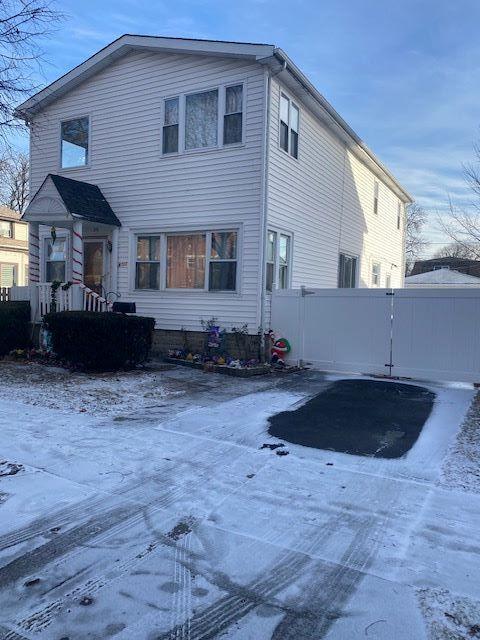 view of snow covered house