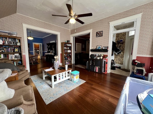 living room with ceiling fan, lofted ceiling, and dark hardwood / wood-style flooring