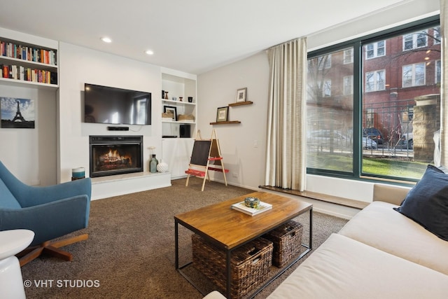 living room with carpet flooring and built in features