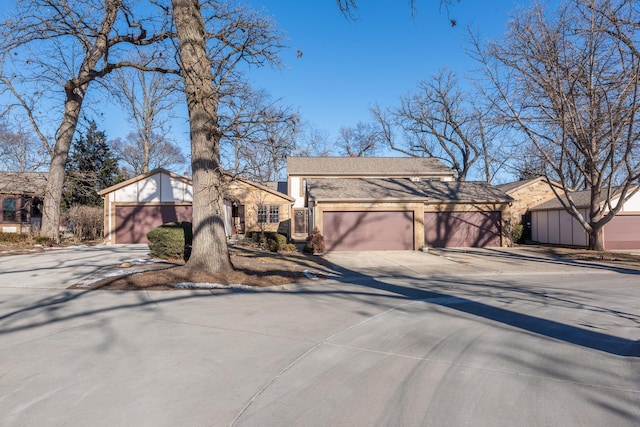 ranch-style house featuring a garage