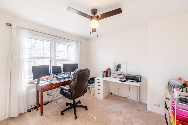 home office with light colored carpet and ceiling fan