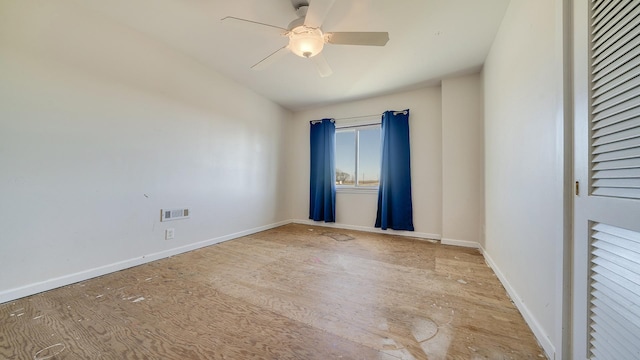 empty room featuring ceiling fan